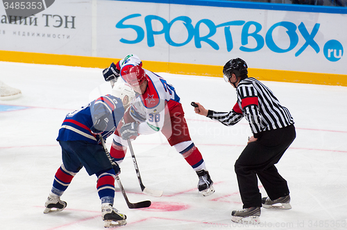 Image of A. Koznev (9) and A. Nikolishin (38) on faceoff