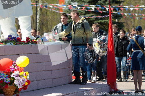 Image of Bikers lay flowers