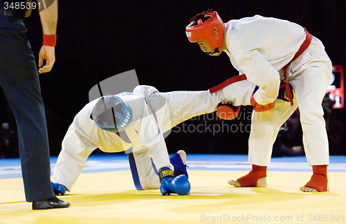 Image of Tursunov S. (Red) and Sagyn K. (Blue) fight