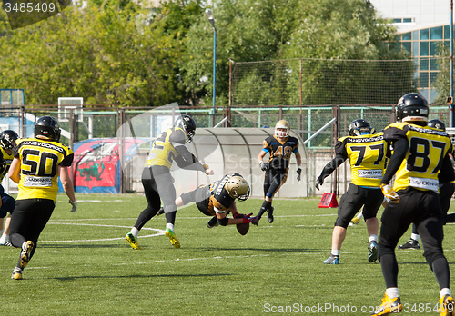 Image of V. Shtanko (12) fall down getting ball