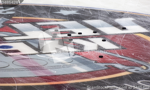 Image of Pucks on the ice rink