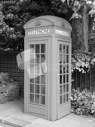 Image of Black and white Red phone box in London