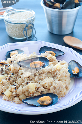 Image of Warm quinoa salad with mussels, tomatoes and potatoes