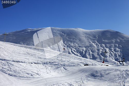 Image of Gondola lift and ski slope
