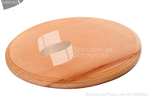 Image of Round wooden kitchen board on white background