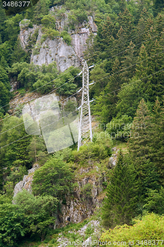 Image of hillside power pole