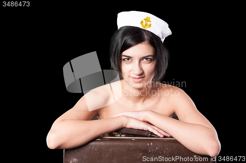 Image of Young sailor girl with suitcase