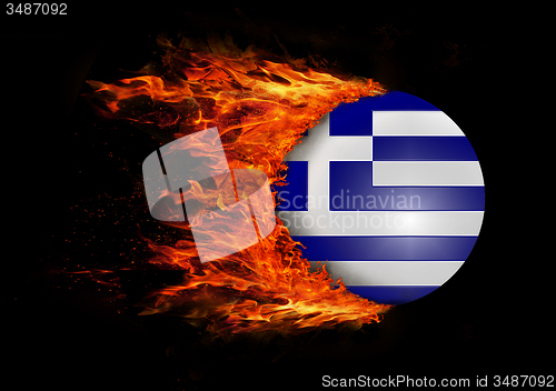 Image of Flag with a trail of fire - Greece