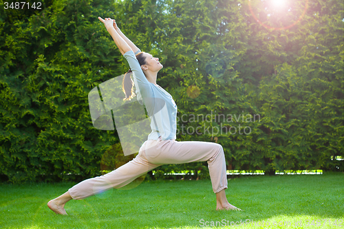 Image of adult woman doing yoga