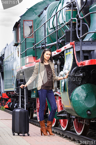 Image of beautiful middle-aged women in retro style travel