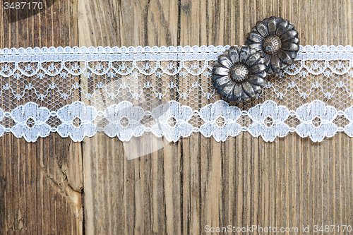 Image of vintage button and lace tape