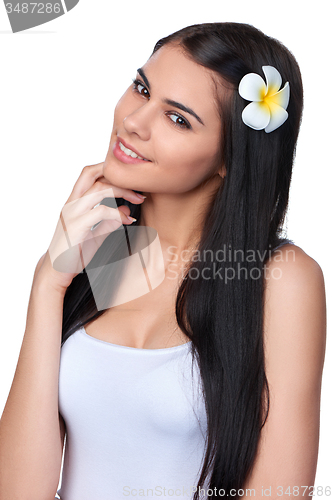 Image of Teen female with Plumeria Flower