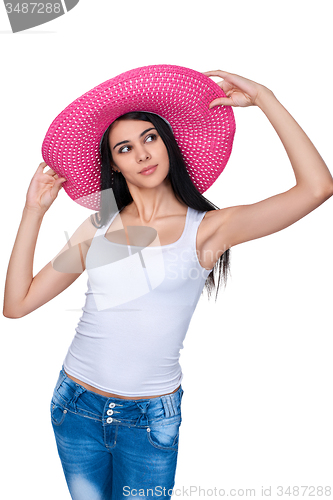 Image of Casual woman in pink straw hat