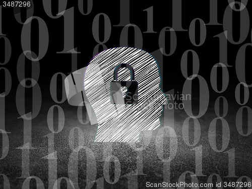 Image of Data concept: Head With Padlock in grunge dark room