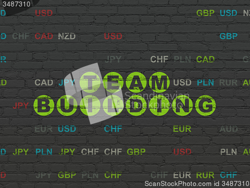 Image of Business concept: Team Building on wall background