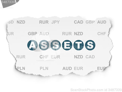 Image of Currency concept: Assets on Torn Paper background