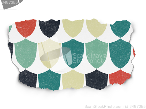 Image of Safety concept: Shield icons on Torn Paper background