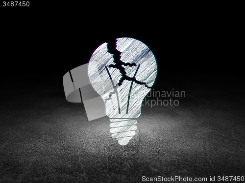Image of Business concept: Light Bulb in grunge dark room