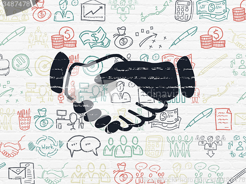 Image of Finance concept: Handshake on wall background