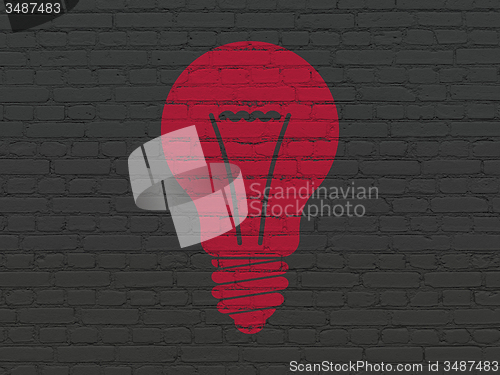 Image of Business concept: Light Bulb on wall background
