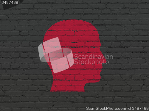 Image of Business concept: Head on wall background