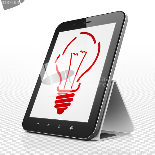 Image of Finance concept: Tablet Computer with Light Bulb on display