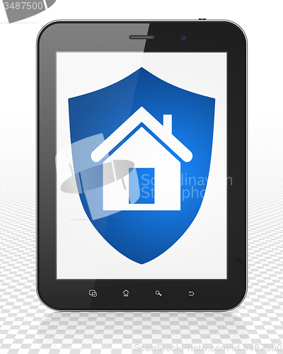 Image of Finance concept: Tablet Pc Computer with Shield on display