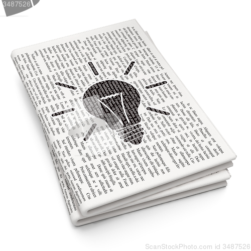 Image of Business concept: Light Bulb on Newspaper background