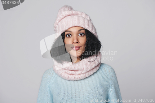 Image of Laughing mixed race winter woman