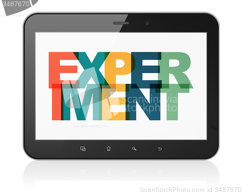 Image of Science concept: Tablet Computer with Experiment on  display