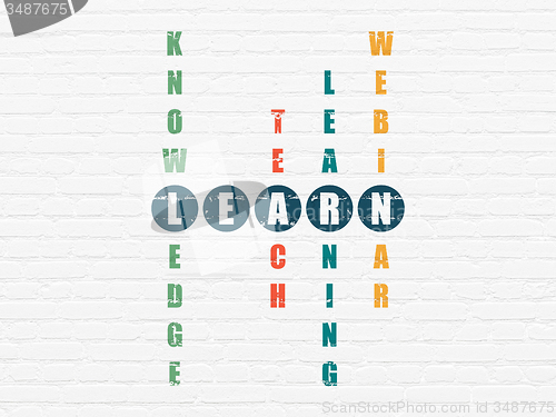 Image of Studying concept: word Learn in solving Crossword Puzzle
