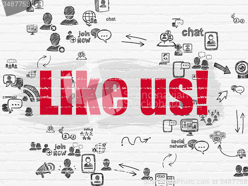 Image of Social network concept: Like us! on wall background