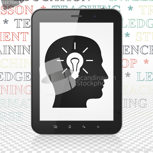 Image of Studying concept: Tablet Computer with Head With Light Bulb on display