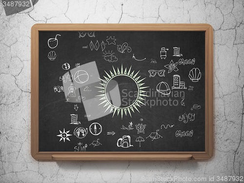 Image of Tourism concept: Sun on School Board background