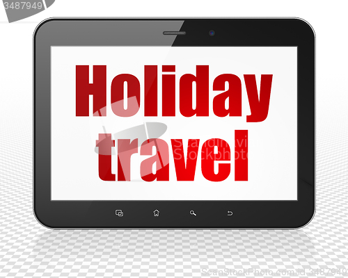 Image of Travel concept: Tablet Pc Computer with Holiday Travel on display