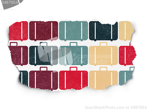 Image of Vacation concept: Bag icons on Torn Paper background