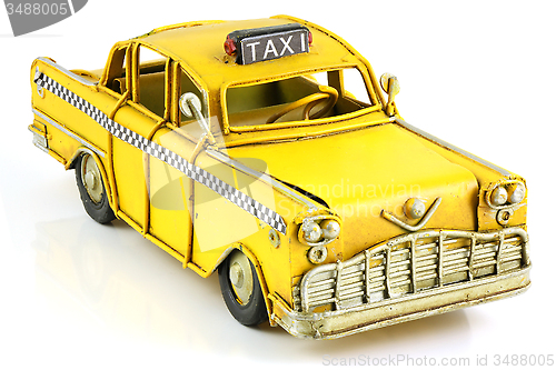 Image of Old toy yellow taxi