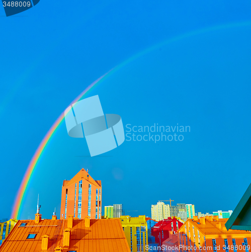 Image of Double rainbow over the city