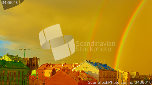 Image of Double rainbow over the city