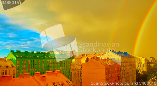 Image of Double rainbow over the city