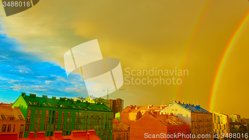 Image of Double rainbow over the city