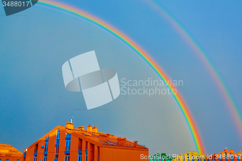 Image of Double rainbow over the city