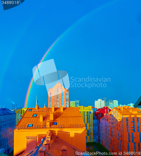 Image of Double rainbow over the city