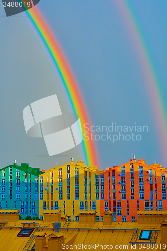 Image of Double rainbow over the city