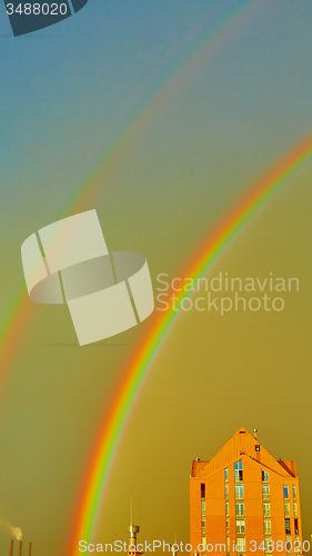 Image of Double rainbow over the city