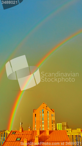 Image of Double rainbow over the city