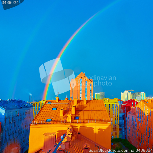 Image of Double rainbow over the city