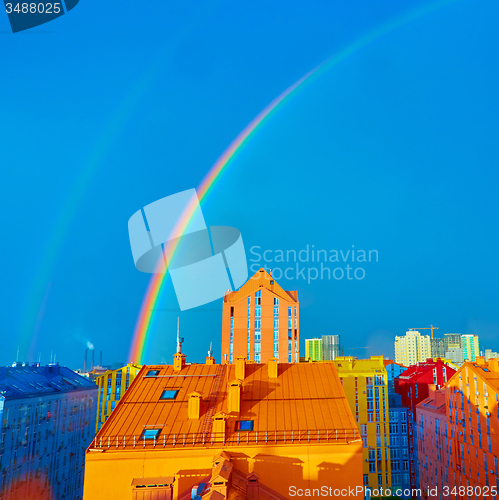 Image of Double rainbow over the city