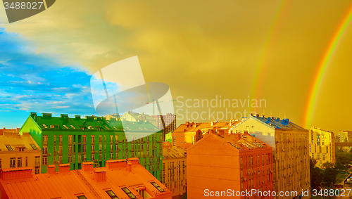 Image of Double rainbow over the city