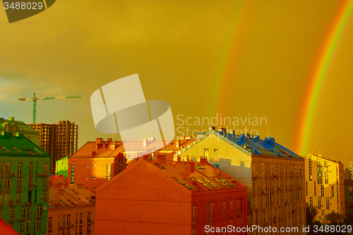 Image of Double rainbow over the city